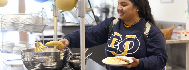 A picture of a student getting food